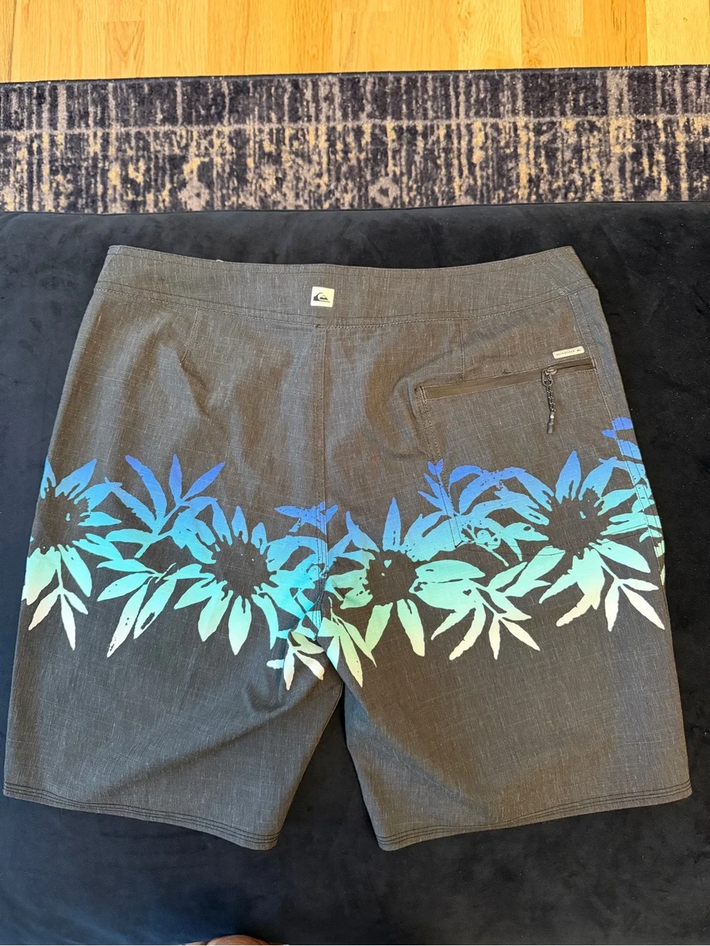 Quiksilver Men’s Black Boardshorts with Blue-Teal Floral Band